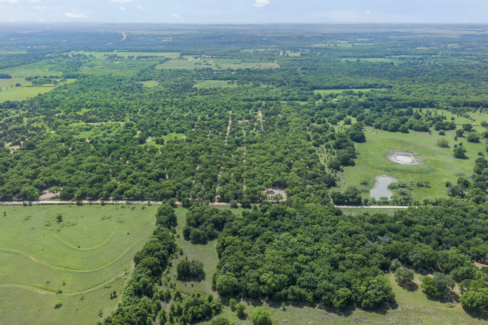 Brazos Point Ranch aerial view — 2.7-7 acres for sale in Kopperl, TX, Texas
