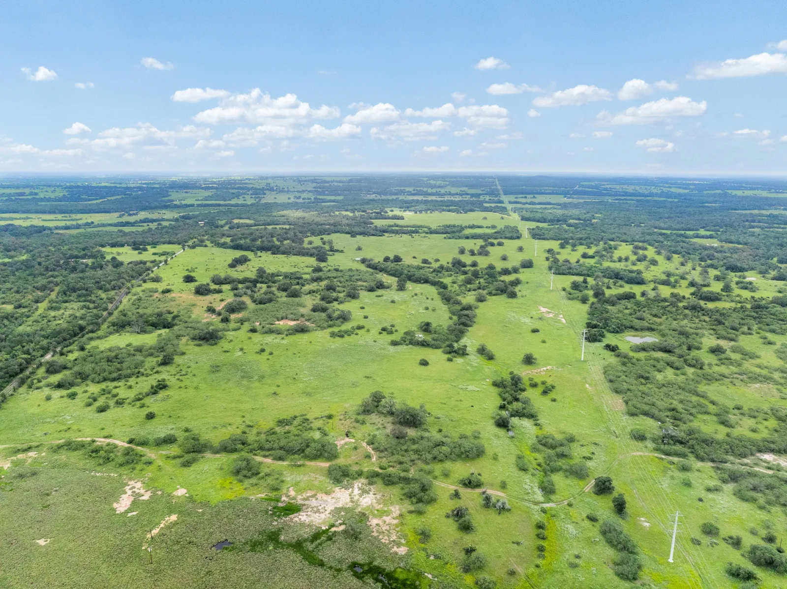 Rolling green Texas acreage — Campo de Sueños in Lockhart, TX