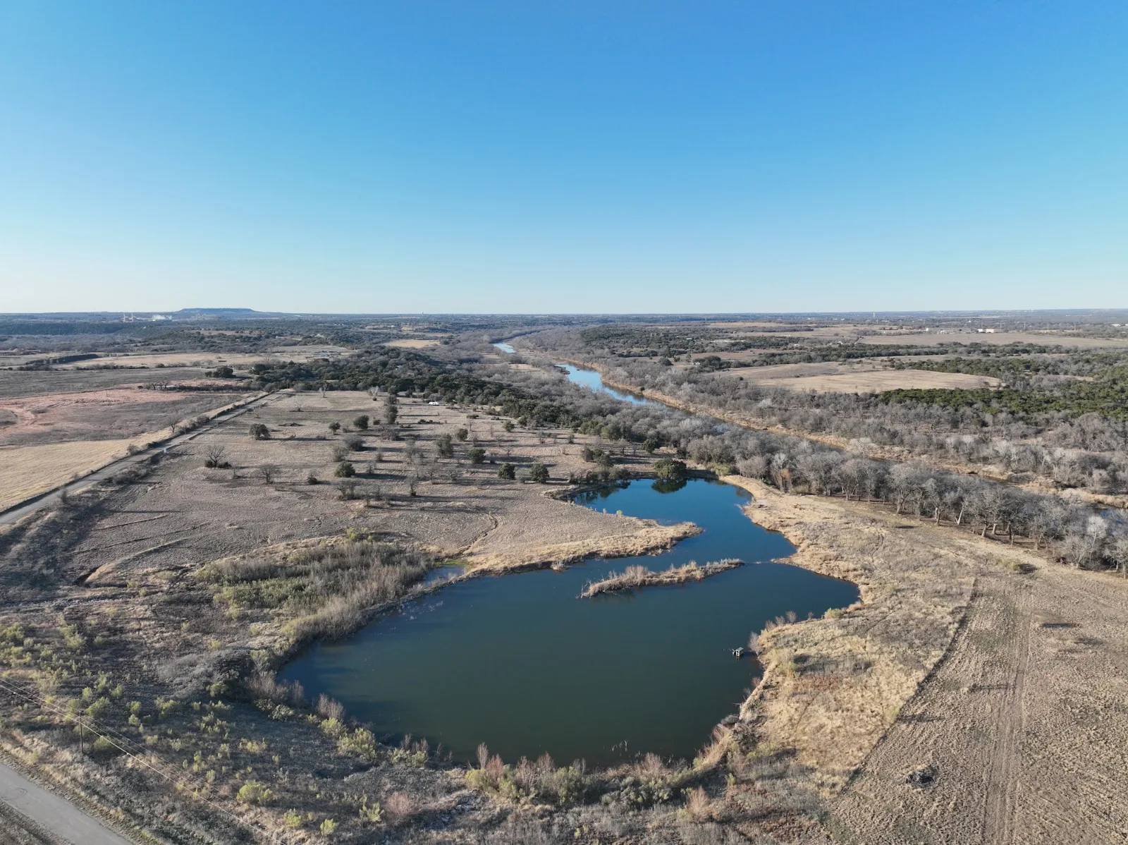Land to build a house in Texas — surveyed buildable acreage with oak trees in Central Texas