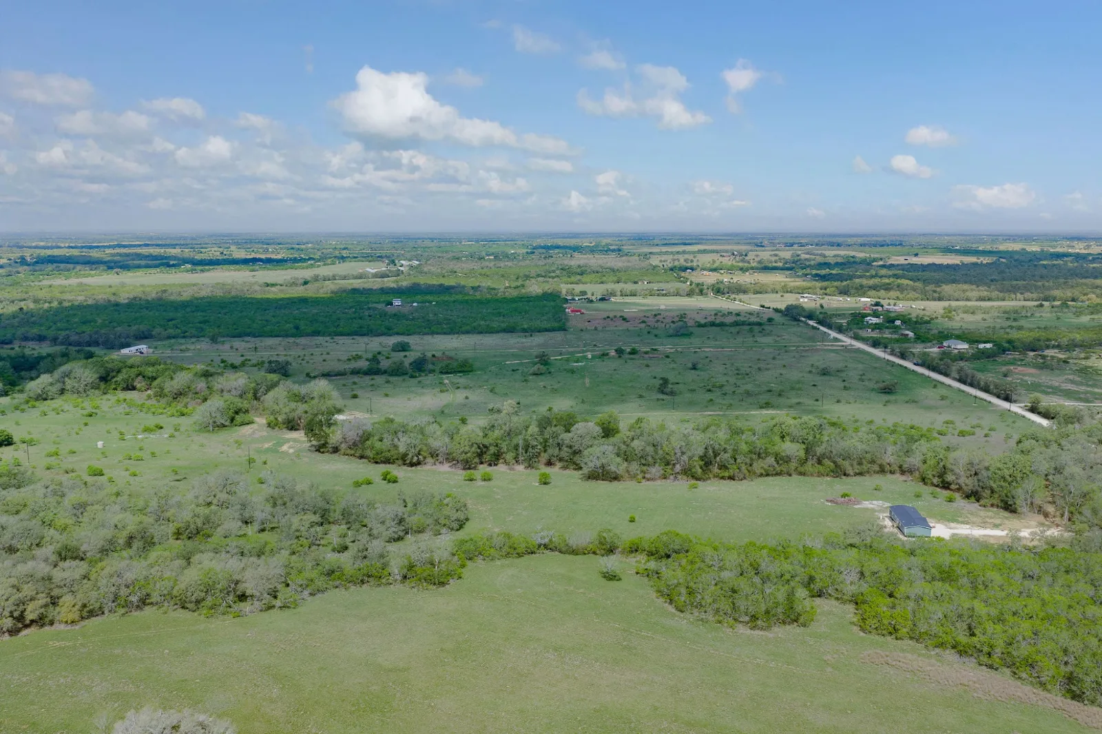 Tenney Creek Ranch aerial photo 3 — 10.5-12.5 acres of Texas land for sale in Dale, TX